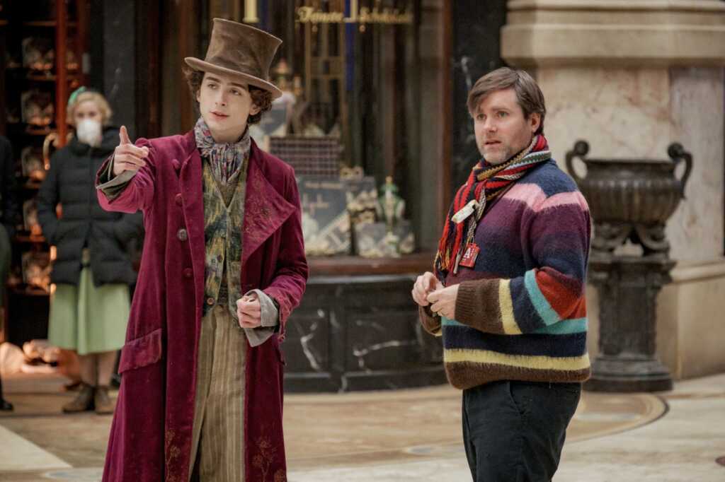 Timothée Chalamet and Paul King on the set of Wonka (2023)